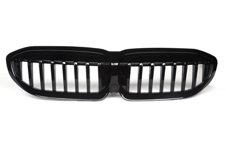 A black, dual-section car grille with vertical slats is positioned against a plain white background, suggesting a new automotive part ready for installation.