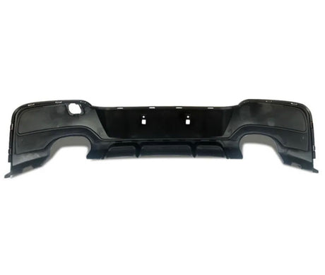 Black car bumper with cutouts for exhaust and mounting. The bumper is designed for rear attachment, featuring smooth contours and a flat backdrop, isolated on a plain white surface.