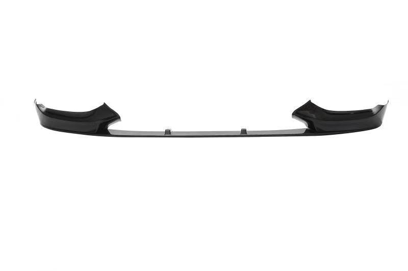 A black car front lip spoiler, elevated slightly, spans horizontally against a plain white background, suggesting aerodynamic enhancement for vehicle performance.