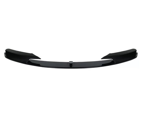 Black car front splitter with a glossy finish, featuring aerodynamic fins on both sides. It is isolated against a plain white background.