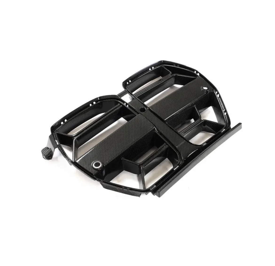 A black carbon fiber car grille with a sleek, angular design sits on a plain white background, showcasing its glossy surface and distinct framework.
