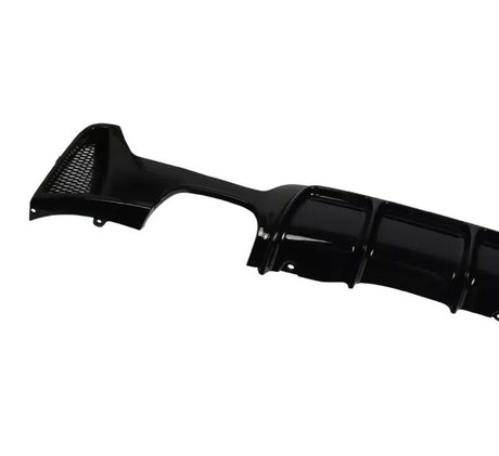 Black car bumper diffuser, featuring a glossy finish and integrated mesh vent, displayed against a white background. The design includes curved aerodynamic grooves for enhanced vehicle performance.