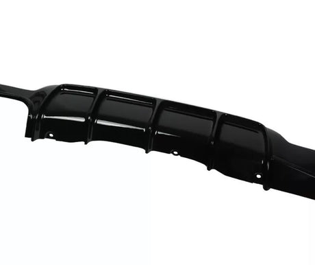 A black, glossy car bumper with six curved sections features mounting holes. It's positioned against a plain, white background, indicating it is a standalone product image.