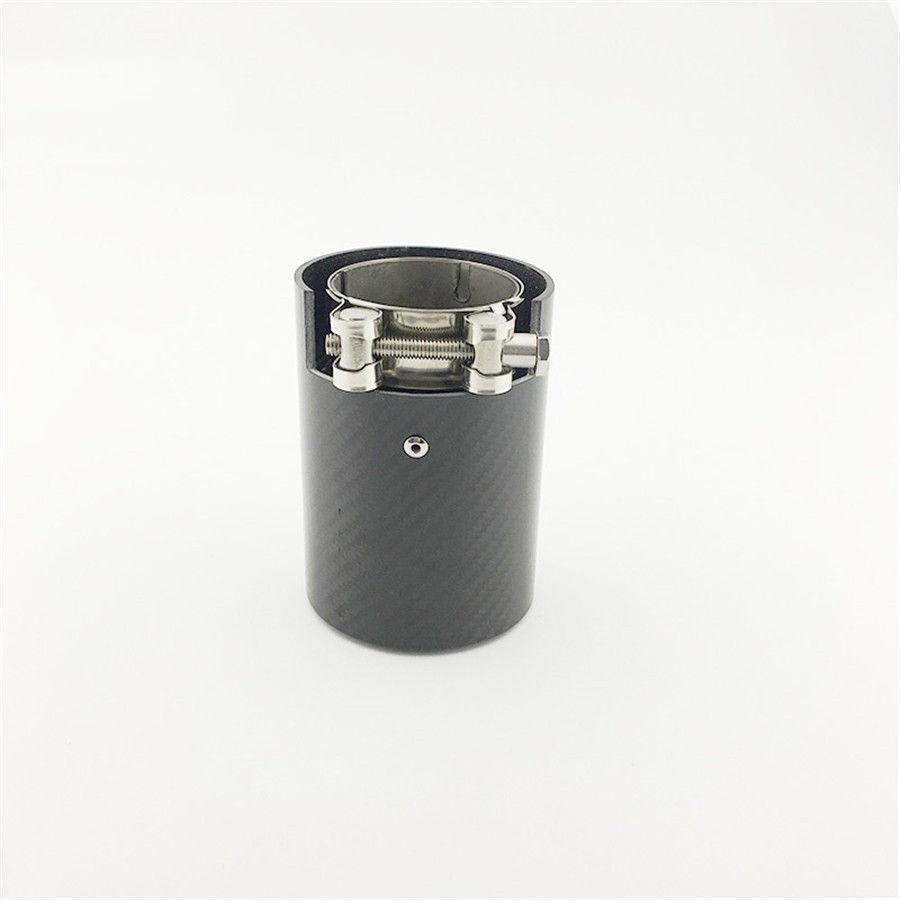 A cylindrical, carbon-fiber exhaust tip with a metal clamp sits on a plain white background, showcasing its sleek, industrial design.