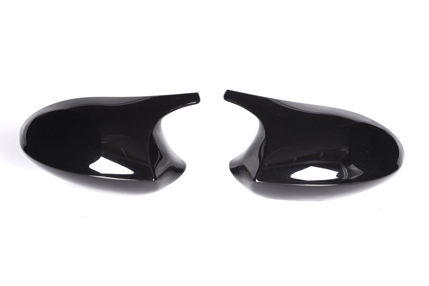 Two glossy black side mirror covers facing each other on a white background, with a sleek, curved design.
