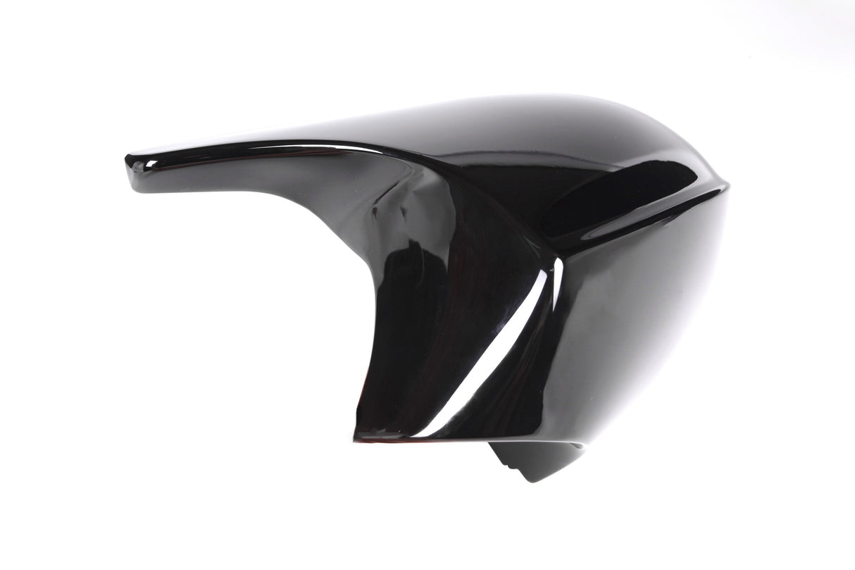 A glossy black motorcycle fairing sits on a white background, showcasing its smooth, aerodynamic curves and reflective surface.