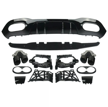 Car parts are laid out for assembly, including a black bumper diffuser, exhaust tips, and various mounting brackets. The components are organized neatly on a plain white background.