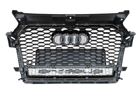 A black hexagonal-patterned car grille displays four rings at the center, set against a gray, seamless background.