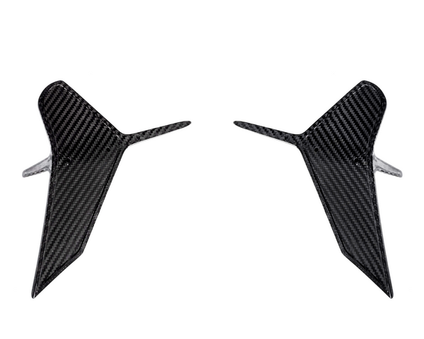 Two symmetrical, carbon fiber aerodynamic winglets are displayed, pointing slightly outward, set against a plain white background.