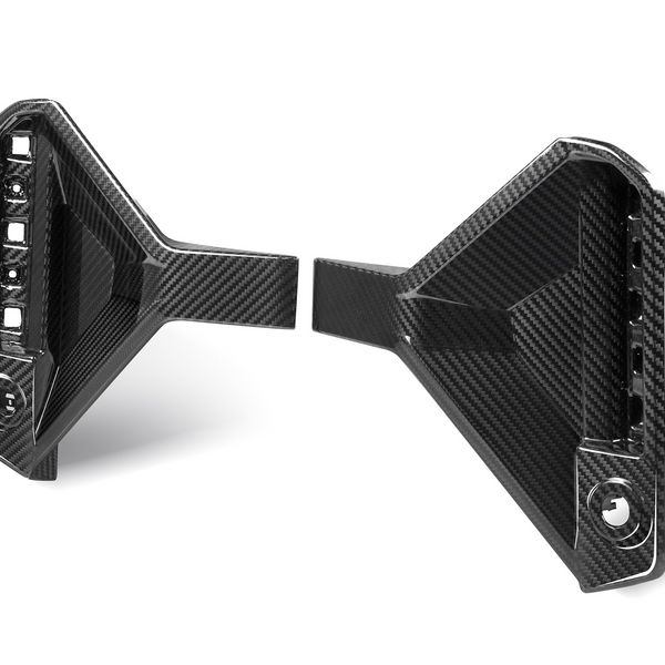 Carbon fiber bracket with geometric design, displaying attachment points. Positioned on a white background, highlighting its sleek, angular appearance. The material's texture is visibly detailed.
