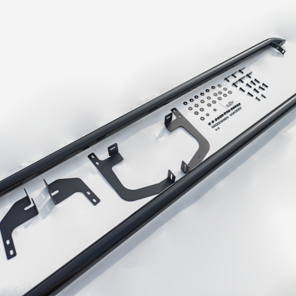 Black metal side step assembly, unassembled, positioned on a white surface with brackets, bolts, and washers lined up methodically, ready for installation.