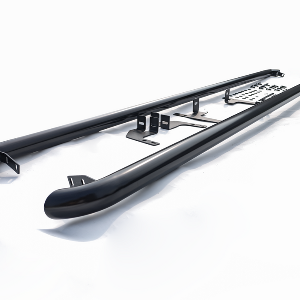 A pair of black side steps with mounting brackets lay flat on a white background, intended for installation on a vehicle to assist entry and exit.