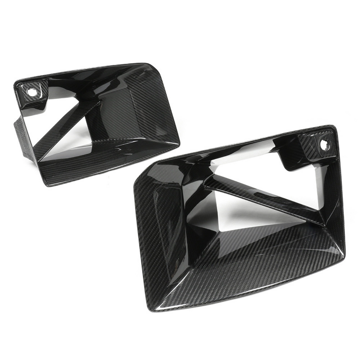 Two sleek carbon fiber car air intake vents are displayed against a plain white background, showcasing their glossy, angular design and texture.