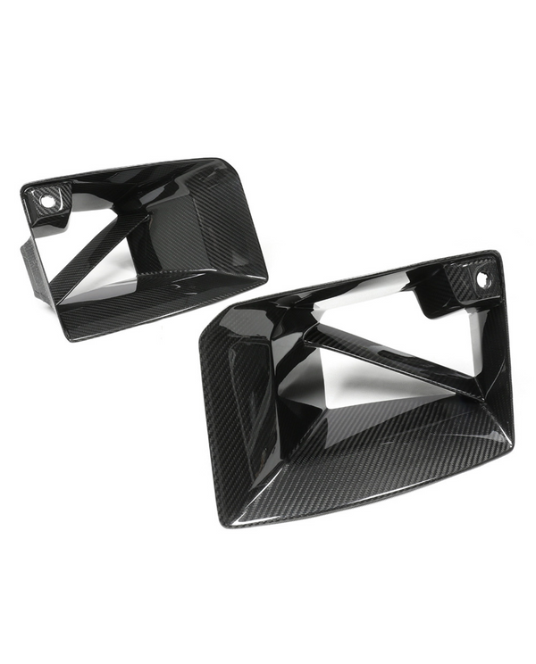 Two sleek carbon fiber car air intake vents are displayed against a plain white background, showcasing their glossy, angular design and texture.