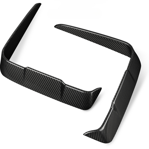 Two black carbon fiber car splitters are positioned on a plain white background, showcasing their glossy surface and aerodynamic design features.