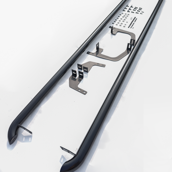 Two black metal bars with mounting brackets and holes lie on a table displaying installation instructions. Surrounding them are small hardware pieces arranged neatly.