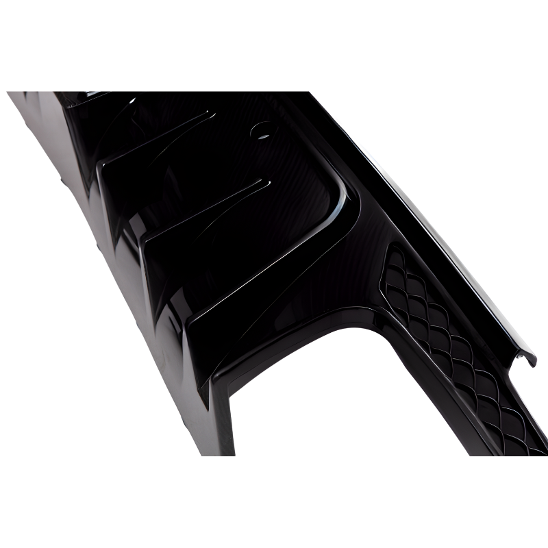 Glossy black car bumper with angular fin-like extensions and a textured mesh area, positioned against a plain white background.