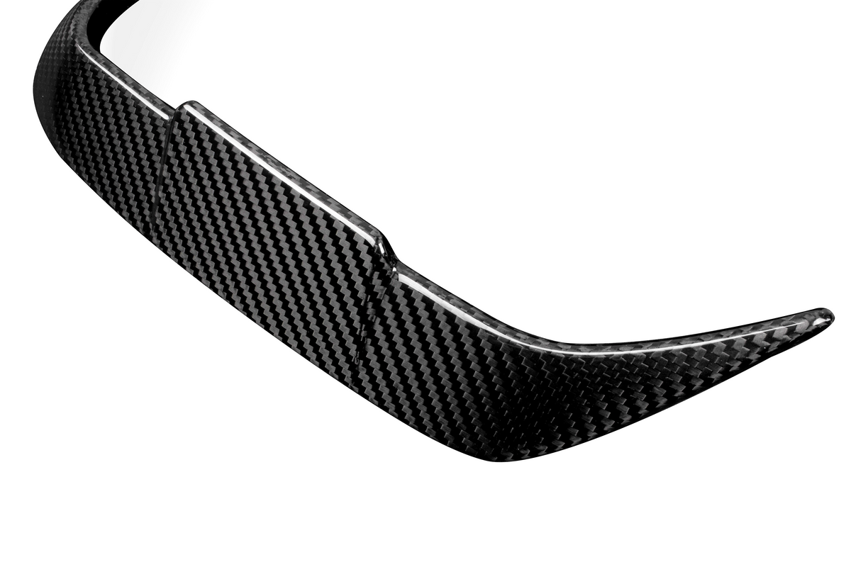 Curved, black carbon fiber car spoiler with a glossy finish; positioned against a white background, emphasizing its sleek, aerodynamic design.