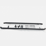 Black metal side steps with mounting brackets and bolts are arranged on a white surface, suggesting an installation kit for a vehicle.