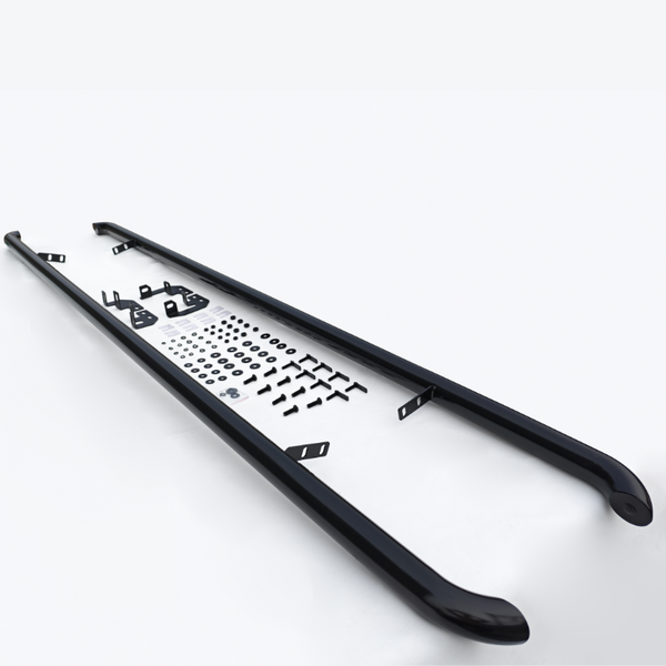 Two black metal roof rails rest on a white surface, accompanied by various mounting hardware, including brackets, screws, and washers, laid out in an organized manner.