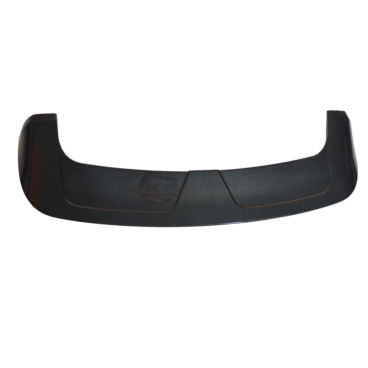 Carbon fiber car spoiler resting on a white background, featuring a curved design with textured surface and angular ends, suggesting an aerodynamic function.