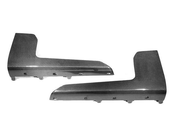 Two carbon fiber covers placed side by side, showcasing sleek black and gray diagonal patterns, with multiple round holes for attachment, set against a plain white background.