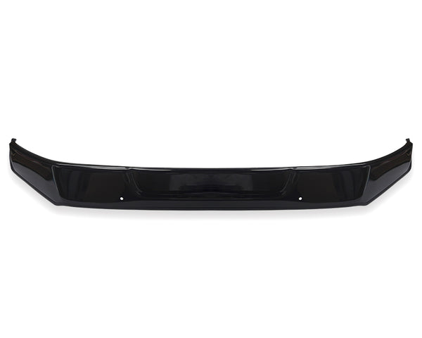 A black car bumper, curved with a smooth surface, is displayed against a plain white background, highlighting its sleek design.