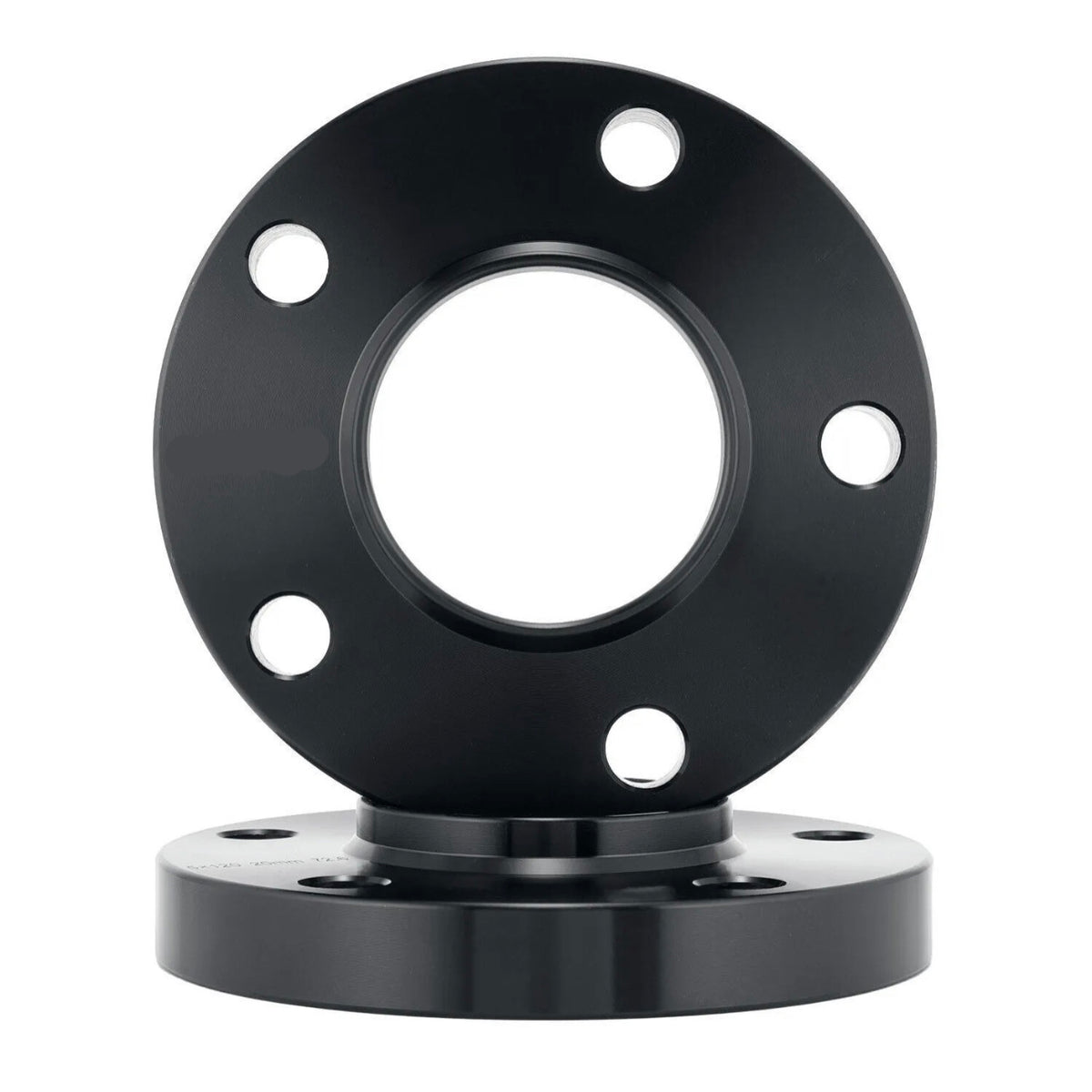 Black metal flange with a circular shape, featuring four evenly spaced bolt holes, rests vertically on another identical flange. The background is plain white, highlighting the object.