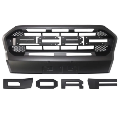 A black vehicle grille with a honeycomb pattern and slots, accompanied by detached black letters spelling "DORF," arranged on a plain white background.