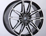A black and silver multi-spoke alloy car wheel with a BMW logo is positioned upright against a plain white background, showcasing a sleek, modern design.