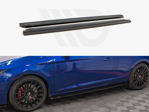 Two black car side skirts are shown above a blue sports car. The car features black wheels with red brake calipers and is positioned on a checkered floor.