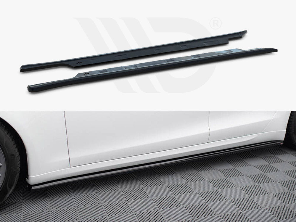 Two elongated, black side skirts are positioned above an image showing them installed along the lower sides of a white car, parked on a patterned gray surface.