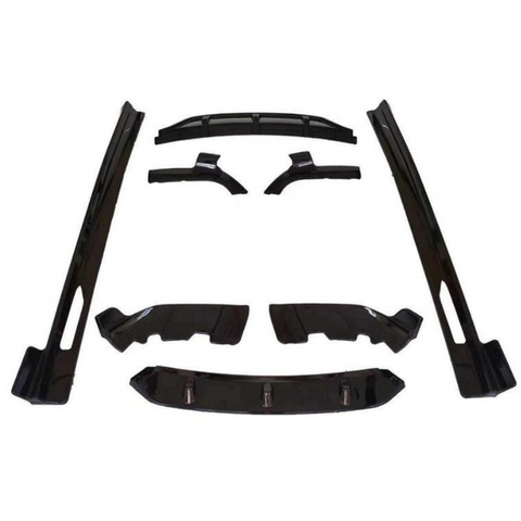 Black car body kit pieces arranged symmetrically on a white background. The set includes side skirts, splitters, and a diffuser, designed for automotive modification and enhancement.