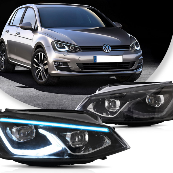 A silver hatchback car is parked on a dark surface, showcasing its two modern, illuminated headlights with blue accents, positioned prominently in front of the vehicle.