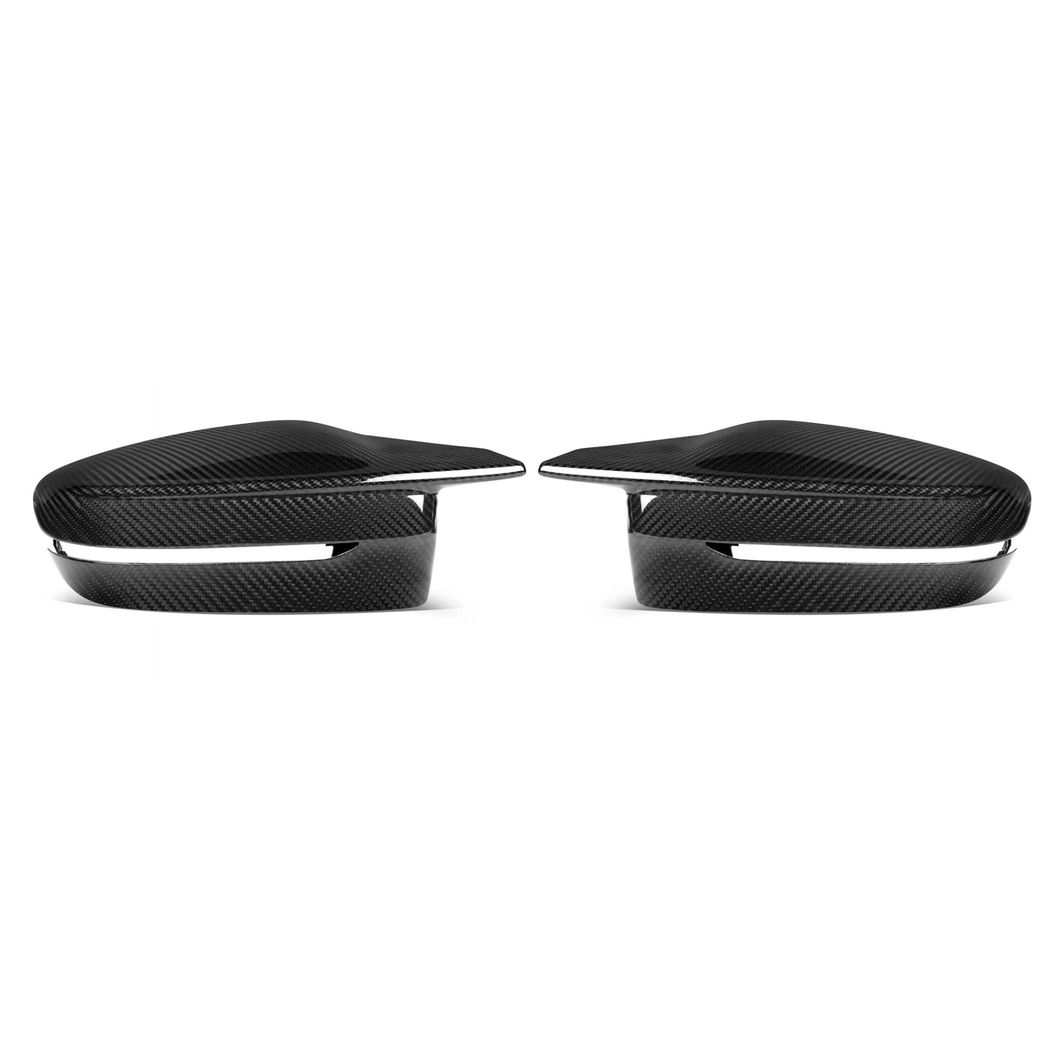 Two black carbon fiber side mirrors, facing each other. They appear sleek and aerodynamic, set against a plain white background, showcasing their glossy finish and detailed texture.