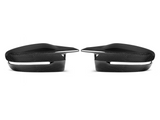 Two black carbon fiber side mirrors, facing each other. They appear sleek and aerodynamic, set against a plain white background, showcasing their glossy finish and detailed texture.