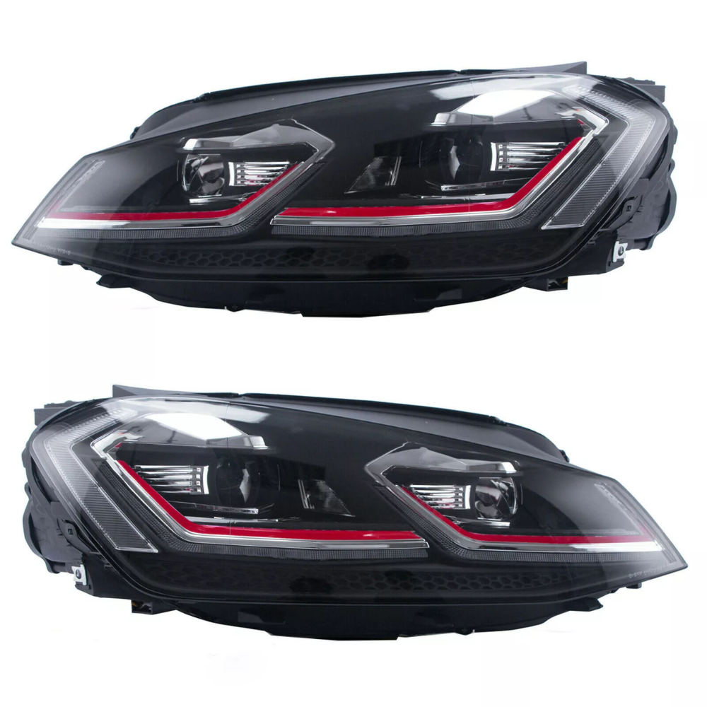 Two black vehicle headlights, each featuring sleek LED designs with red accents, are shown against a white background.