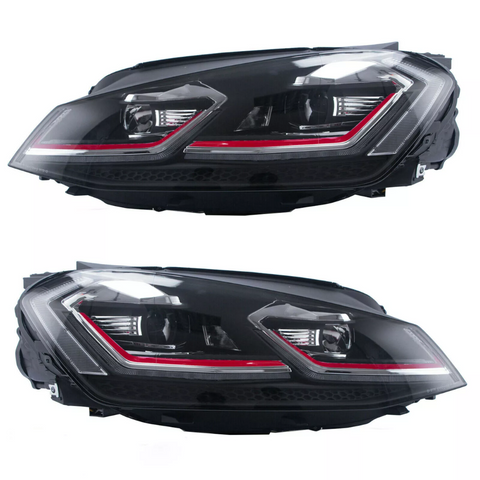 Two black vehicle headlights, each featuring sleek LED designs with red accents, are shown against a white background.