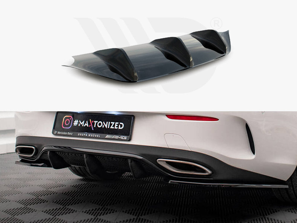 A car diffuser is displayed in two contexts: a close-up view above and installed on a white car below, with text reading “#MAXTONIZED, Mercedes-Benz, GRUPA WRÓBEL, AMG.” The car is parked on a checkered floor.