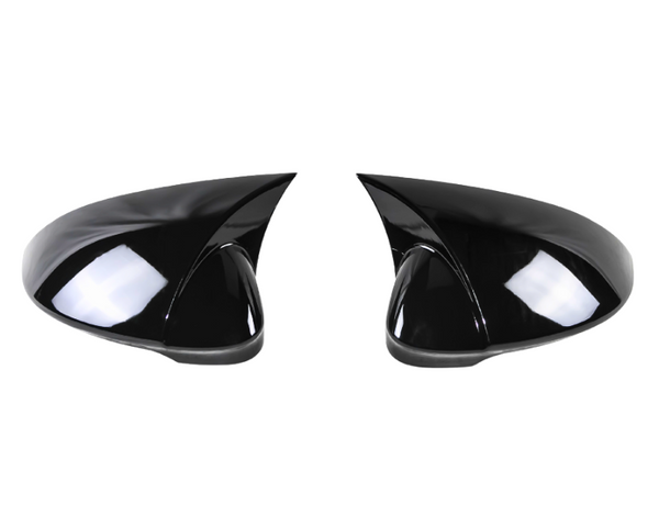 Two black, glossy side mirrors with aerodynamic design sit facing each other against a plain white background, reflecting light and showing smooth surface contours.