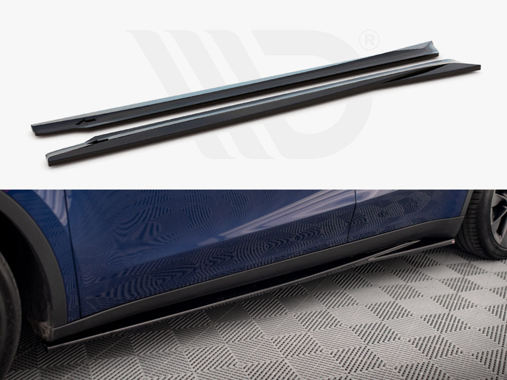 Two aerodynamic side skirts are shown, designed to be installed on a car. They are black and sleek, depicted both separately and attached to a blue car standing on a checkered floor.