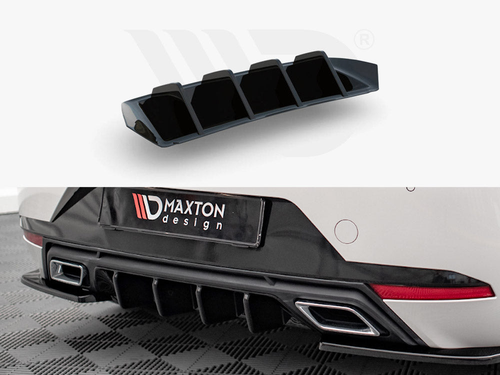 A black car diffuser with fins is shown. It's attached to the rear bumper of a white vehicle. The context includes a garage floor and "MAXTON design" text on the car.