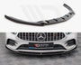 A black car front splitter is displayed; it enhances the aerodynamics of a white Mercedes-Benz with a prominent grille. A sign reads “Maxton design” on the bumper.
