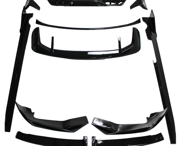 Black car body kit components, including spoilers and side skirts, are arranged on a white background. The parts are neatly organized, showcasing their glossy finish and aerodynamic design.