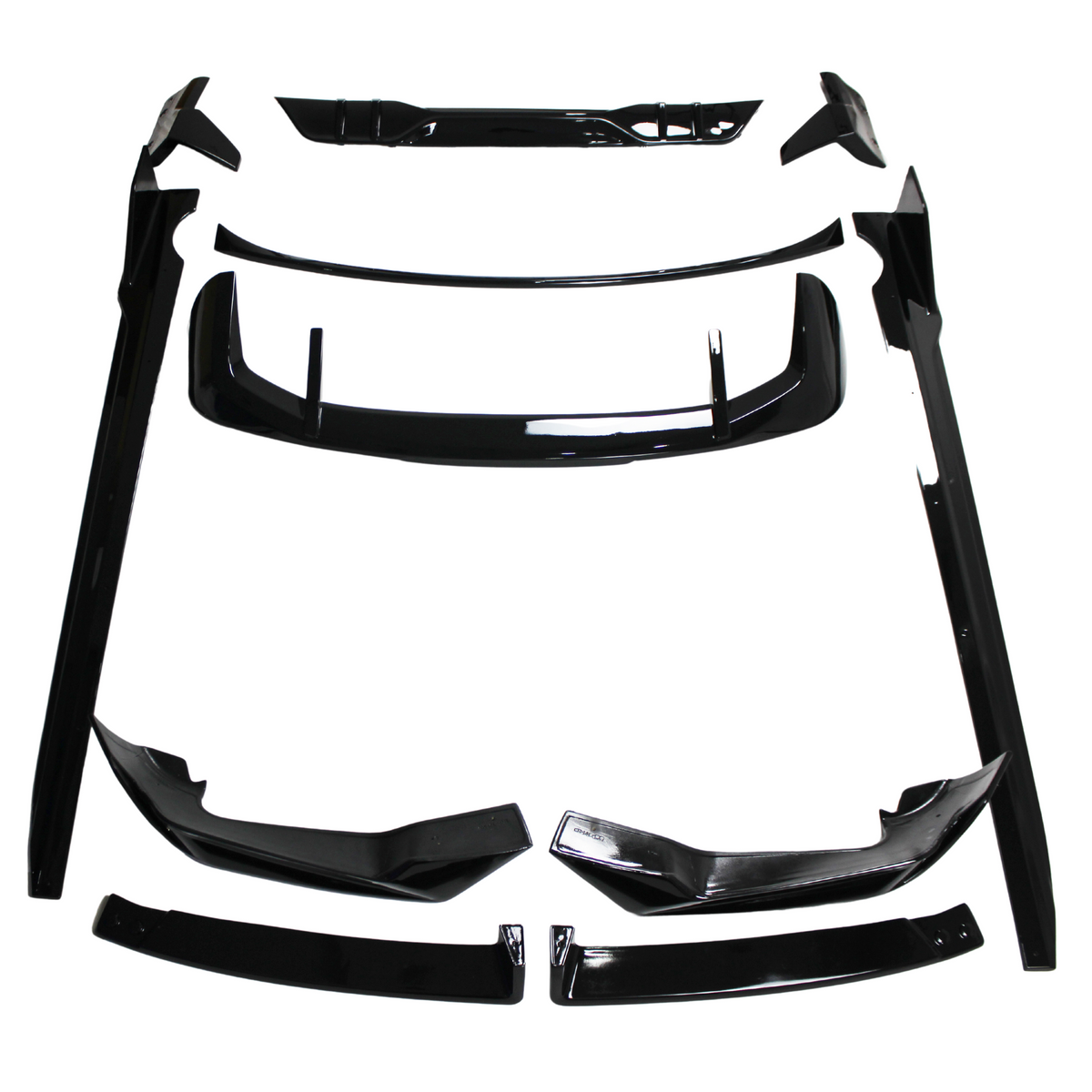 Black car body kit components, including spoilers and side skirts, are arranged on a white background. The parts are neatly organized, showcasing their glossy finish and aerodynamic design.