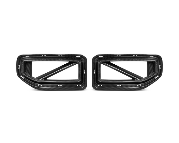 Two carbon fiber car exhaust trim pieces, designed with rectangular frames and diagonal supports, are positioned side by side against a plain white background.