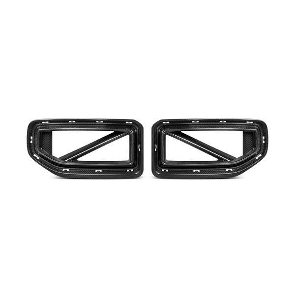 Two carbon fiber car exhaust trim pieces, designed with rectangular frames and diagonal supports, are positioned side by side against a plain white background.