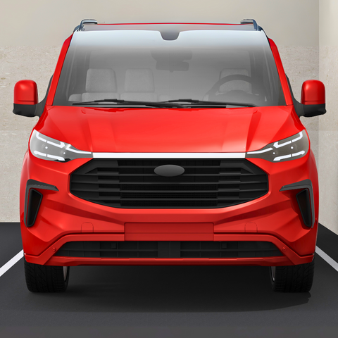 A red van is parked against a beige wall. It features a large black grille, sleek headlights, and visible side mirrors, emphasizing its modern design.