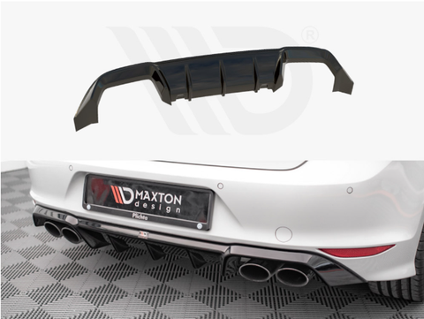 A black car diffuser is shown above a car's rear bumper featuring quad exhaust pipes on a checkered surface. The license plate reads "MAXTON design Plichta."