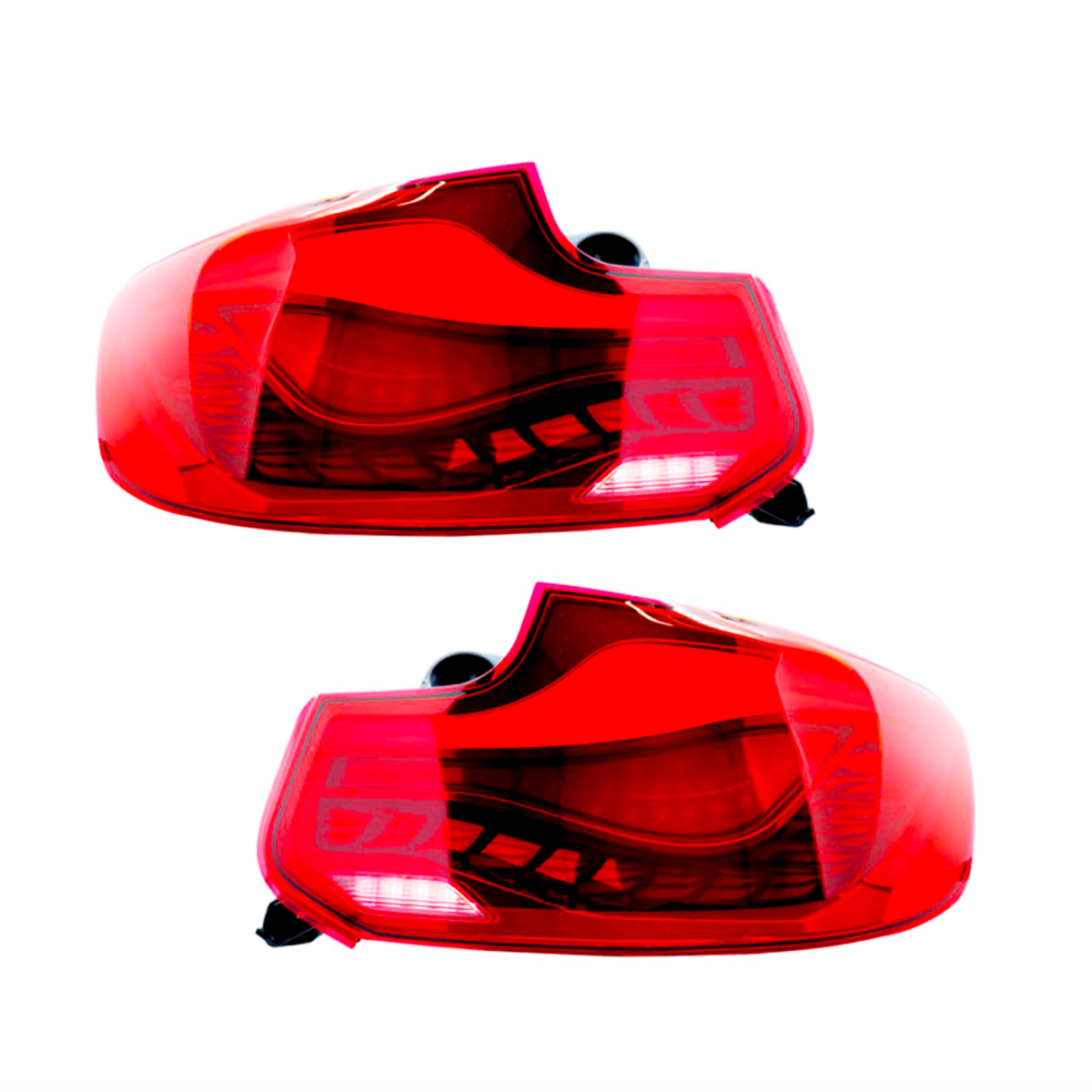 Two red car taillights are displayed side by side on a white background, showcasing their curved design and internal light bulb structure, indicating automotive components.